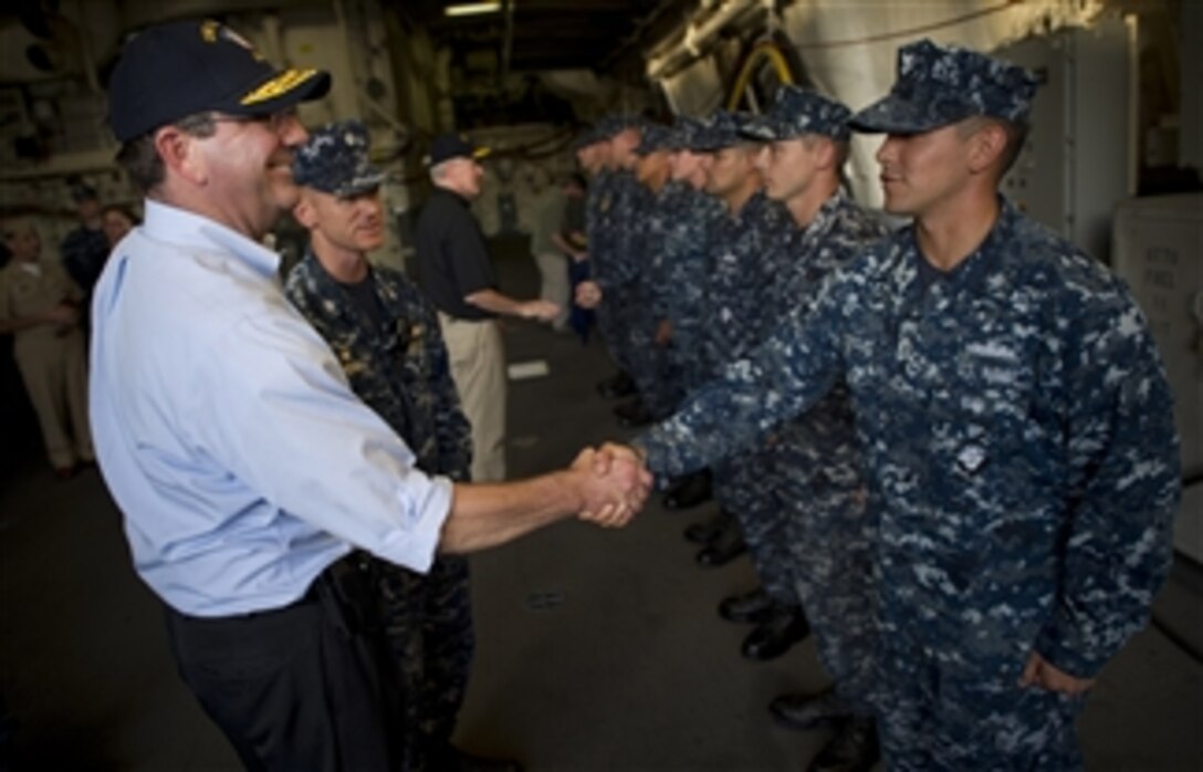 Deputy Secretary of Defense Ashton B. Carter thanks sailors assigned to the USS Freedom (LCS 1) after a tour of the littoral combat ship in San Diego, Calif., on Sept. 26, 2012.  