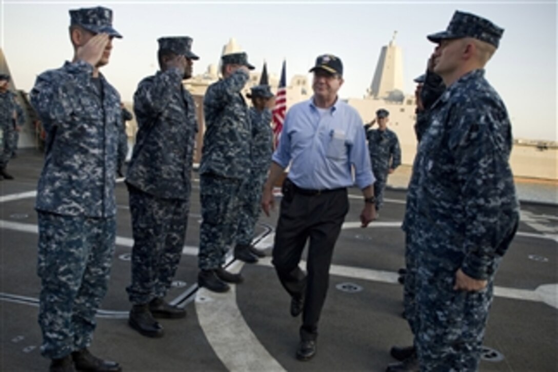 Deputy Secretary of Defense Ashton B. Carter goes through the sideboys as he is piped ashore after visiting the USS Freedom (LCS 1) in San Diego, Calif., on Sept. 26, 2012.  Carter took a tour of the littoral combat ship and thanked members of the crew for their service.  