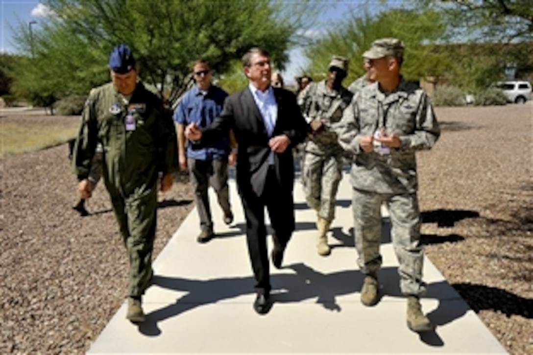 Deputy Defense Secretary Ashton B. Carter visits the Air Force's 162nd Fighter Wing at the Air National Guard Base on at Tucson International Airport, Tucson, Ariz., Sept. 26, 2012.