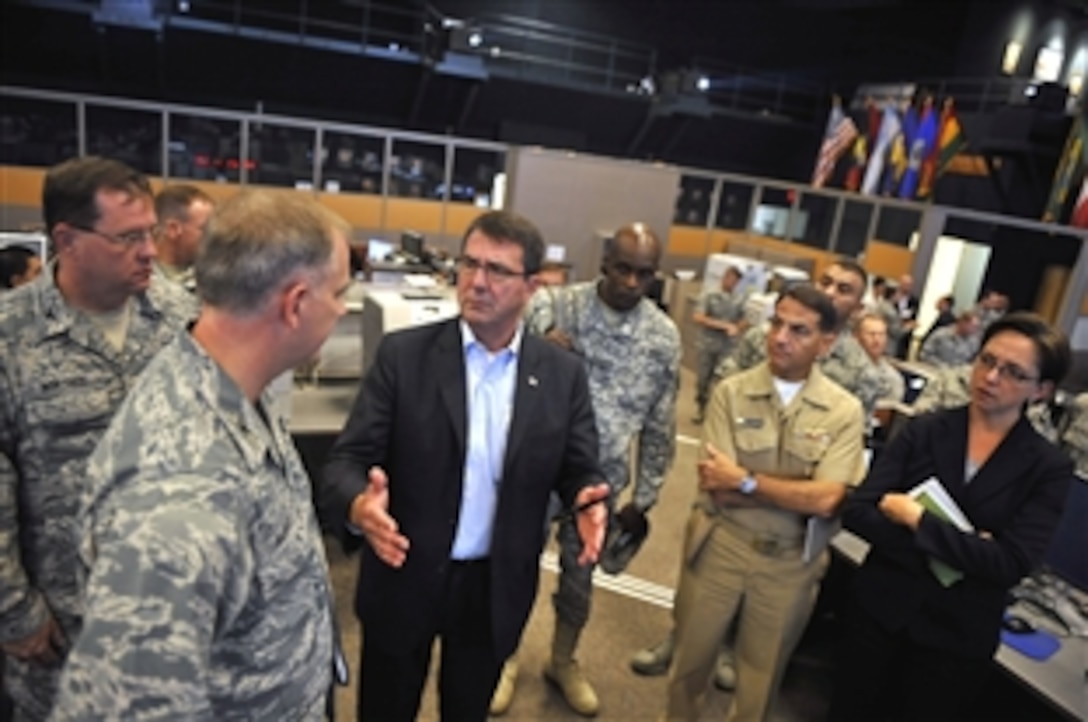 Deputy Defense Secretary Ashton B. Carter receives a tour of the 612 Air and Space Operations Center on Davis-Monthan Air Force Base, Tucson, Ariz., Sept. 26, 2012. Carter visited several installations on his trip. 