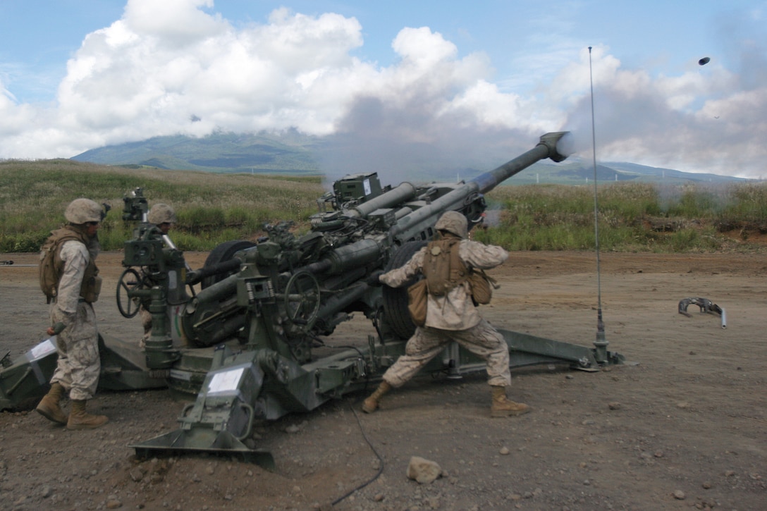 Marines fire a round from an M777A2 155 mm howitzer during Artillery Relocation Training Program 12-2 at the East Fuji Maneuver Area in mainland Japan Sept. 17. Marines conducted 10 days of live-fire artillery training during ARTP 12-2, beginning with battery-level fire and progressing to a regimental shoot. The Marines are with Bravo Battery, 3rd Battalion, 12th Marine Regiment, 3rd Marine Division, III Marine Expeditionary Force. 