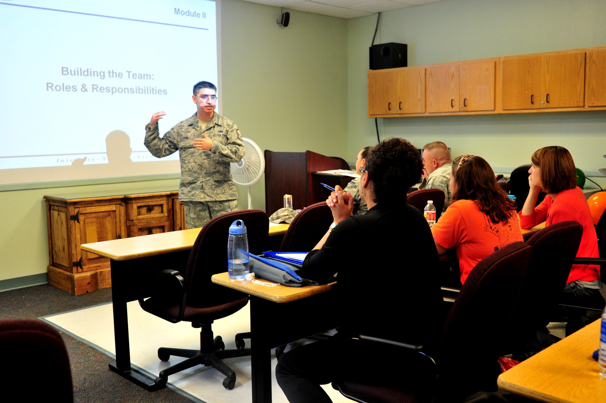 Attendees at the Cannon Key Spouse informative briefing interact with support service facilitators and instructors at Cannon Air Force, N.M., Sept. 28, 2012. The briefings educated future key spouses on how to communicate and guide military spouses in the right direction. (U.S. Air Force photo/Airman 1st Class Xavier Lockley)  