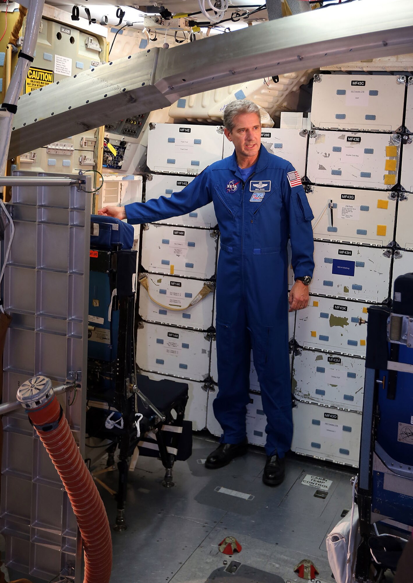 DAYTON, Ohio (09/2012) -- NASA Astronaut Michael Good discusses the capabilities of NASA's first shuttle Crew Compartment Trainer at the National Museum of the U.S. Air Force. (Photo courtesy of Don Popp)