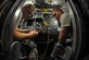 Staff Sgt. Michael Plummer, 2nd Maintenance Squadron communication and navigation mission systems shift supervisor, shows Airman 1st Class Christopher Shelby, 2 MXS COMNAV journeyman, a corroded interphone wire inside a B-52H Stratofortress on Barksdale Air Force Base, La., Sept. 25. Aircrews use the interphones to communicate with each other in the aircraft. Every 450 hours, avionics Airmen inspect the B-52 to ensure its avionics systems are working and free of corrosion. (U.S. Air Force photo/Senior Airman Micaiah Anthony)(RELEASED)