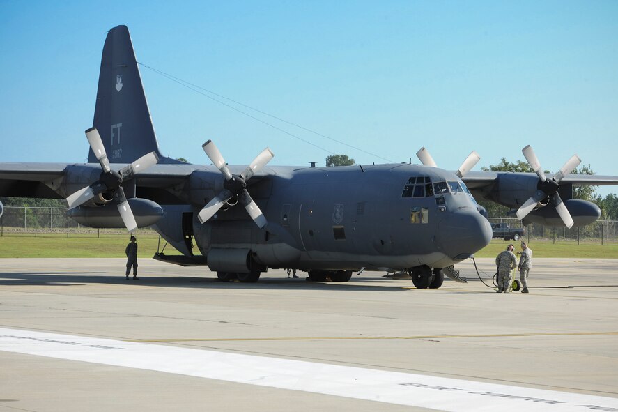U.S. Air Force Tech Sgt. Benjamin Gibbs and Staff Sgt. Ryan James, 723d Aircraft Maintenance Squadron crew chiefs, prepares a HC-130P Combat King for flight at Moody Air Force Base, Ga., Sept. 25, 2012. This HC-130P Combat King was once loaned to the U.S. Coast Guard in the 1980’s. (U.S. Air Force photo by Staff Sgt. Ciara Wymbs/Released)