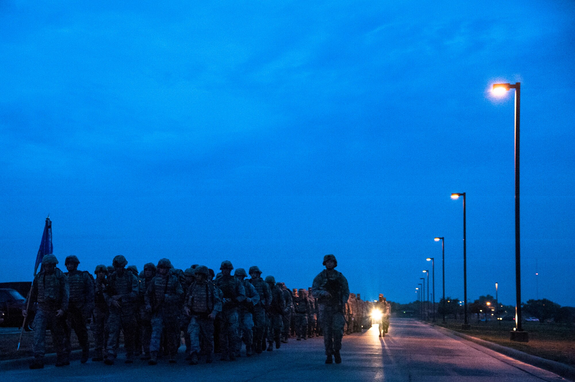 GOODFELLOW AIR FORCE BASE, Texas --Team Goodfellow members finish the last stretch of the Jacobson Memorial March, Sept. 28, 2012. The march was in honor of security forces member Airman 1st Class Elizabeth Jacobson, and marked the seventh anniversary of her death. Jacobson was the first security forces member as well as the first Air Force female to be killed in action in Operation Iraqi Freedom in 2005 by a roadside bomb. (U.S. Air Force photo/Airman 1st Class Michael Smith)