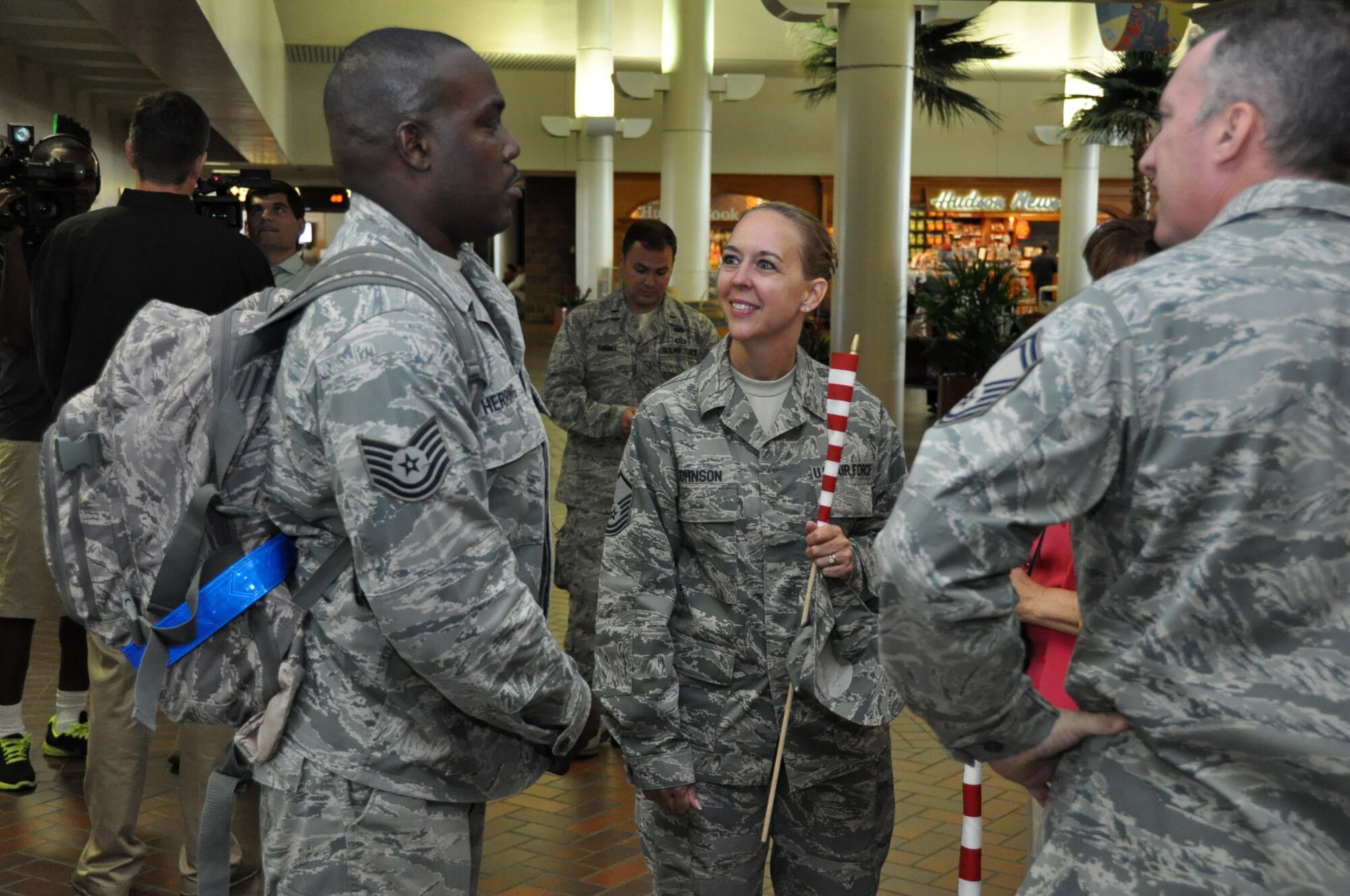 Tech. Sgt. Rodney Herring is welcomed home by members of the 315th Airlift Wing upon returning home from a six month deployment to the Middle East Sept. 28, 2012. The Air Force Reserve Aerial Port members who deployed in March were responsible for cargo and passenger operations at their deployed locations. Herring is a ramp services technician for the 81st Aerial Port Squadron at Joint Base Charleston, S.C. (U.S. Air Force Photo/Michael Dukes)