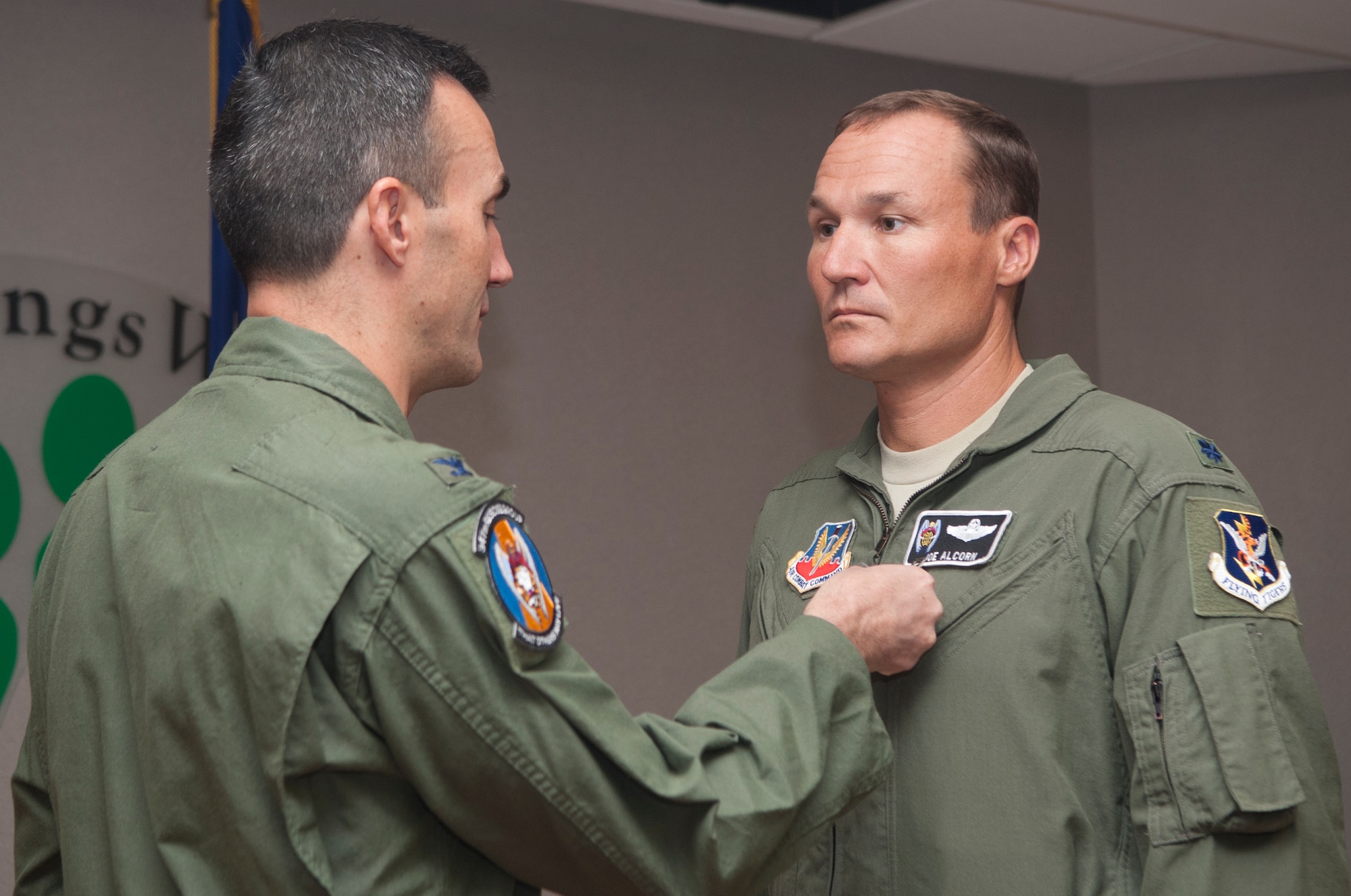 U.S. Air Force Col. Steven Gregg, 347th Rescue Group Commander, pins Lt. Col. Joseph Alcorn, 347th Rescue Group director of staff, with the Bronze Star  Medal at Moody Air Force Base, Ga., Sept. 21, 2012. Alcorn received the award for his hard work and dedication with the 347th RQG and leadership during his deployment  at Camp Bastian, Afghanistan. (U.S. Air Force photo by Airman 1st Class Paul Francis/Released)
