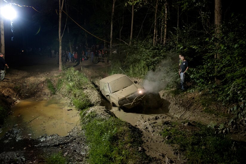 A vehicle gets stuck in a mud pit during a mud bugging competition of the Big Dog Off-Road event in Gore, Va., Sept. 15, 2012. (U.S. Air Force photo/Val Gempis)
