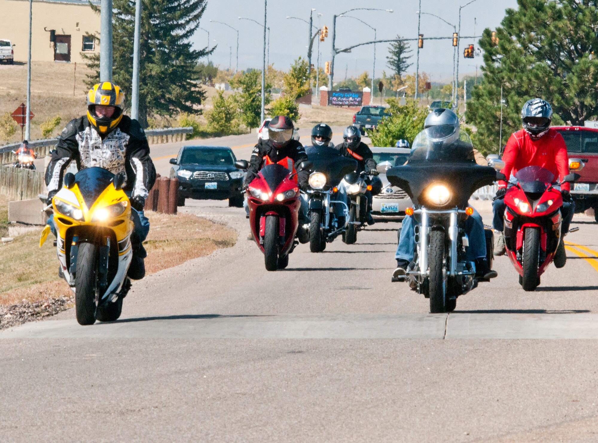 F. E. Warren motorcyclists ride down Missile Drive on their way off base, during a Motorcycle Mentorship Ride Sept. 21. The 160-mile ride went through Wyoming and Colorado. (U.S. Air Force photo by Airman 1st Class Jason Wiese)