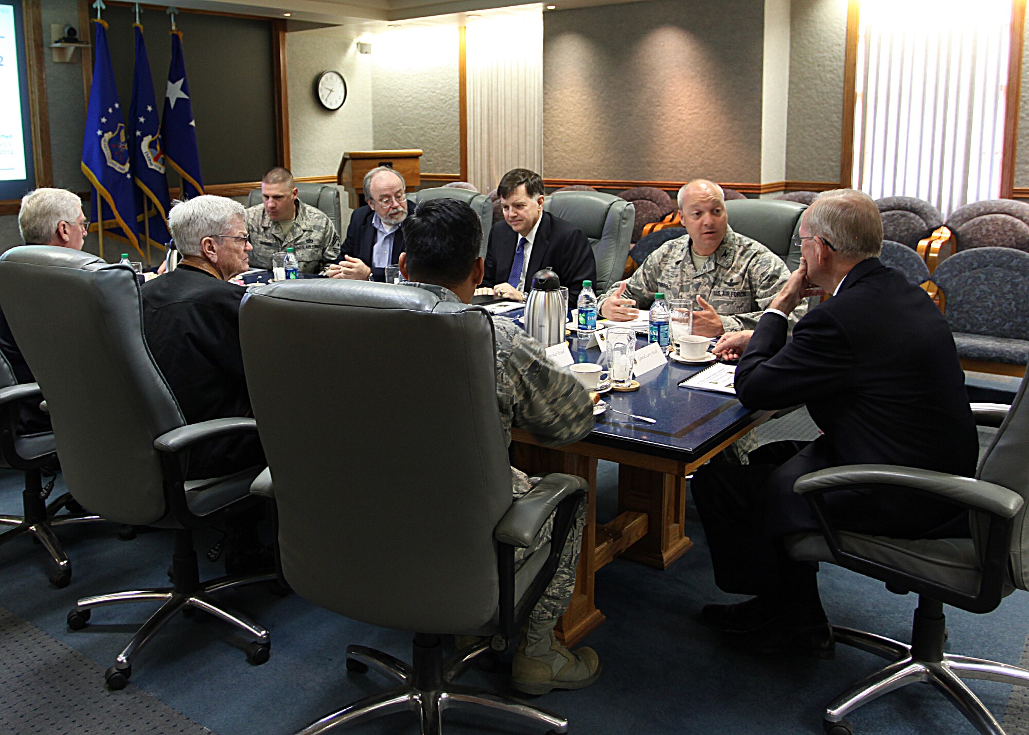 Retired Gen. Larry Welch, former Air Force Chief of Staff; Dr. Peter Nanos, Johns Hopkins University Applied Physics Laboratory; Dr. Robert Selden, Special Government Employee; Jim Gosler, CIA Clandestine Services; and David McDarby, Defense Threat Reduction Agency Nuclear Surety Branch chief, meet with Col. Christopher Coffelt, 90th Missile Wing commander; Col. Heraldo Brual, 341st Missile Wing commander; and Chief Master Sgt. Michael Garrou, 90th Missile Wing command chief, during the Defense Science Board visit to F. E. Warren Air Force Base, Wyo., Sept. 20. (U.S. Air Force photo by Matt Bilden)