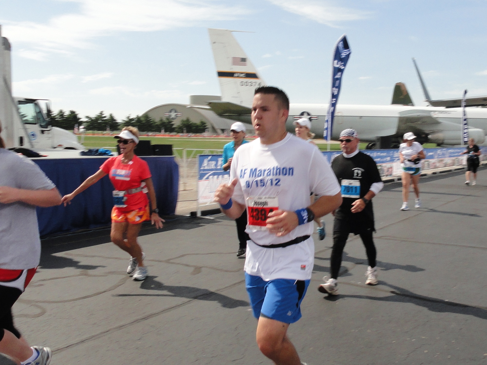WRIGHT-PATTERSON AIR FORCE BASE, Ohio - Tech. Sgt. Joseph Valenzuela, 445th Aeromedical Evacuation Squadron, crosses the finish line of the 2012 Air Force Marathon in 4 hours, 15 minutes Sept. 15. This was his first full marathon. (Courtesy photo)