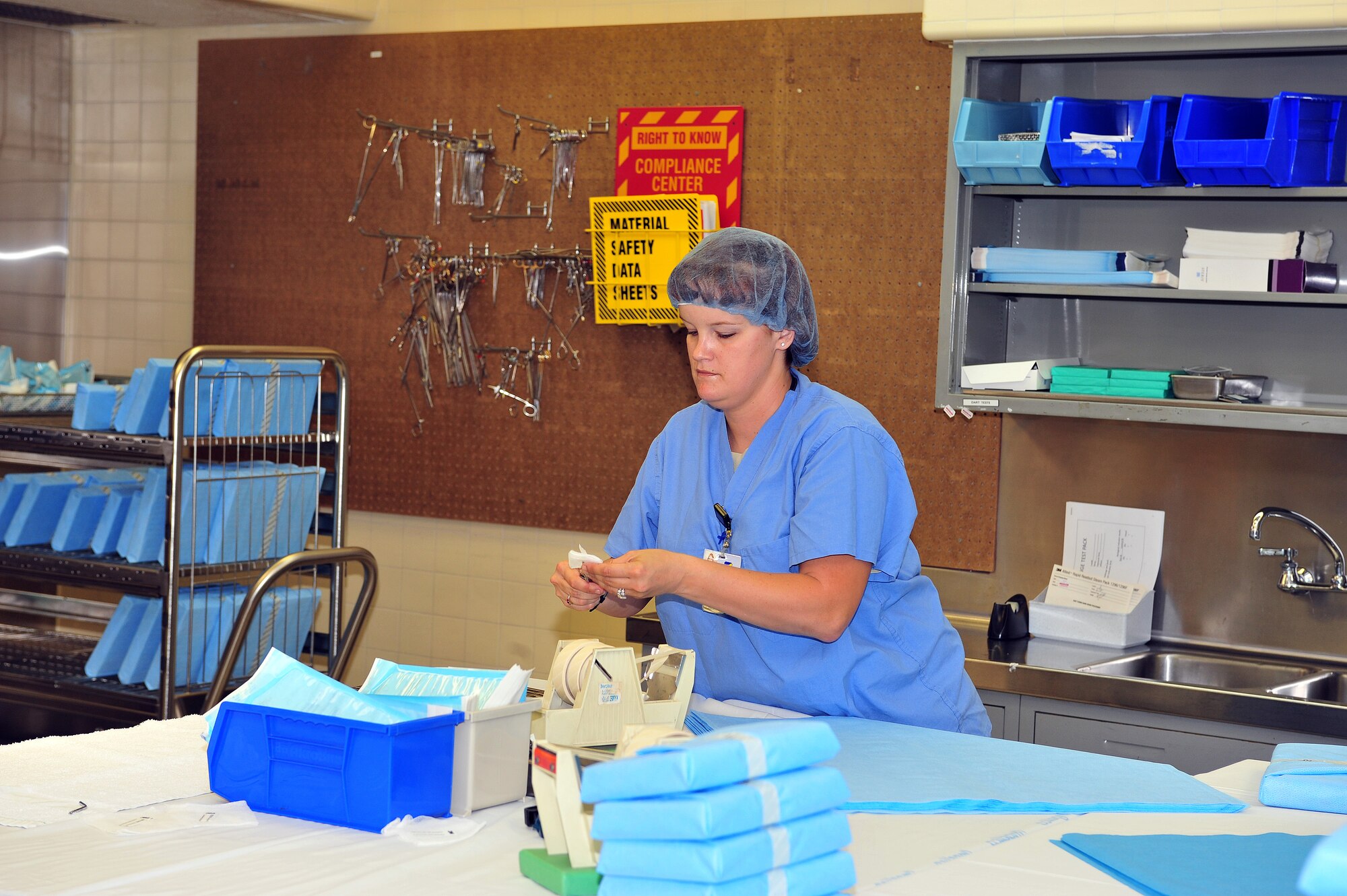 U.S. Air Force Tech. Sgt. Nicole Loughman, 355th Dental Squadron, noncommissioned officer in charge of infection control, puts together a sterile dental tool kit on Davis-Monthan Air Force Base, Ariz., Sept. 25, 2012. Loughman makes sure all instruments that are used in the medical group are sterile and ready for any procedure. (U.S. Air Force photo by Airman 1st Class Josh Slavin/Released)