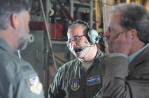 YOUNGSTOWN AIR RESERVE STATION, Ohio -- U.S. Air Force Reserve Senior Master Sgt. Don Cutrer, a chief loadmaster, discusses his reserve duties with civic leaders aboard a C-130 H Hercules orientation flight. The flight was part of a tour for Boy Scouts of America leadership and community members belonging to judicial offices held at YARS, Sept. 26, designed to build advocacy for the Air Force Reserve and inform attendees on the mission and capabilities of the 910th Airlift Wing. U.S. Air Force photo by Mr. Eric M. White.