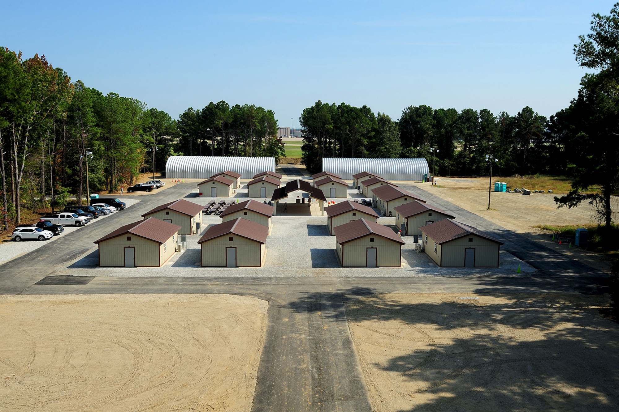 Raptor Town sits completed at Langley Air Force Base, Va., Sept. 27, 2012. Personnel from five U.S. Air Force Rapid Engineer Deployable Heavy Operational Repair Squadron Engineers units came together for 22 weeks to complete construction of Raptor Town’s roads, buildings and latrines, which are used for deployment-training exercises. (U.S. Air Force photo by Staff Sgt. Ashley Hawkins/Released)
