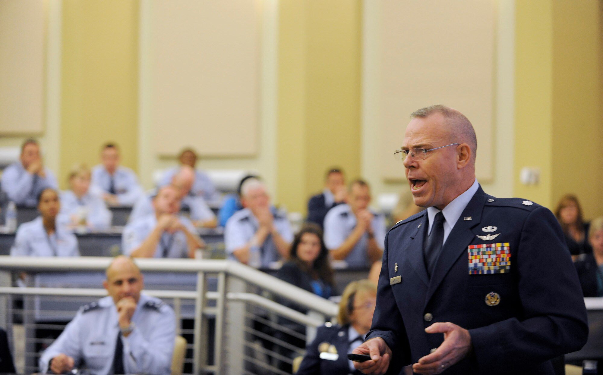 Lt. Col. Gregory Laffitte, from Air Force the Manpower, Personnel and Services directorate, provides Airmen fitness highlights at the Caring for People Forum at Joint Base Andrews, Md., on Sept. 26, 2012.  This is the fourth annual forum which provides strategies for commanders, leaders and care professionals to help Airmen and their families.  (U.S. Air Force photo/Scott M. Ash)