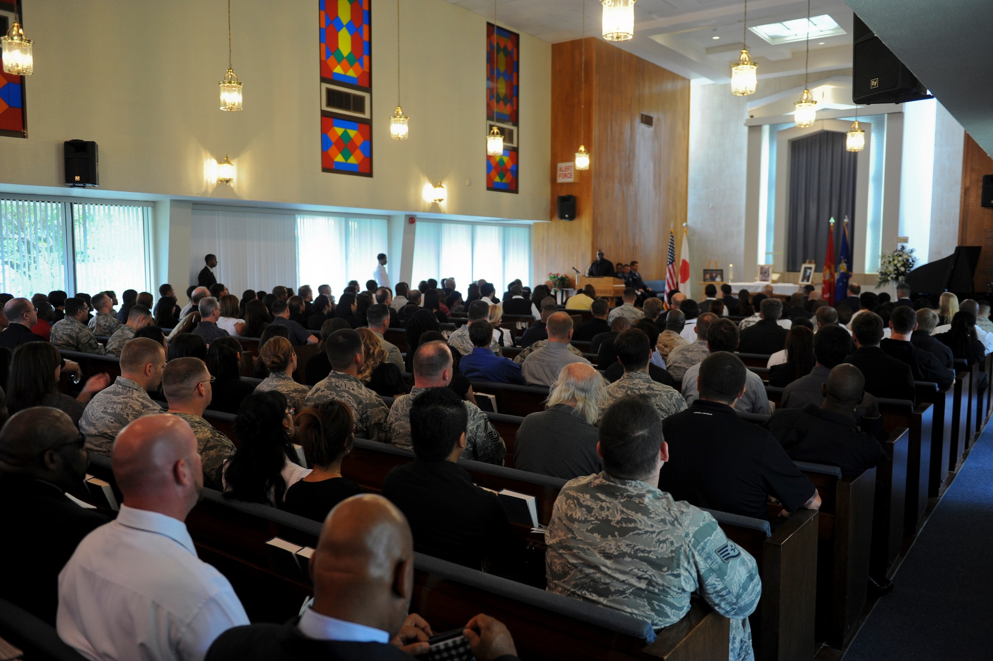 Family members and friends gather as Team Kadena remembers the life of Rashad "Speed" Jackson at Chapel Two on Kadena Air Base, Japan, Sept. 28, 2012. Hundreds of Team Kadena residents paid their respects to Jackson and his family. (U.S. Air Force photo/Airman 1st Class Justin Veazie)