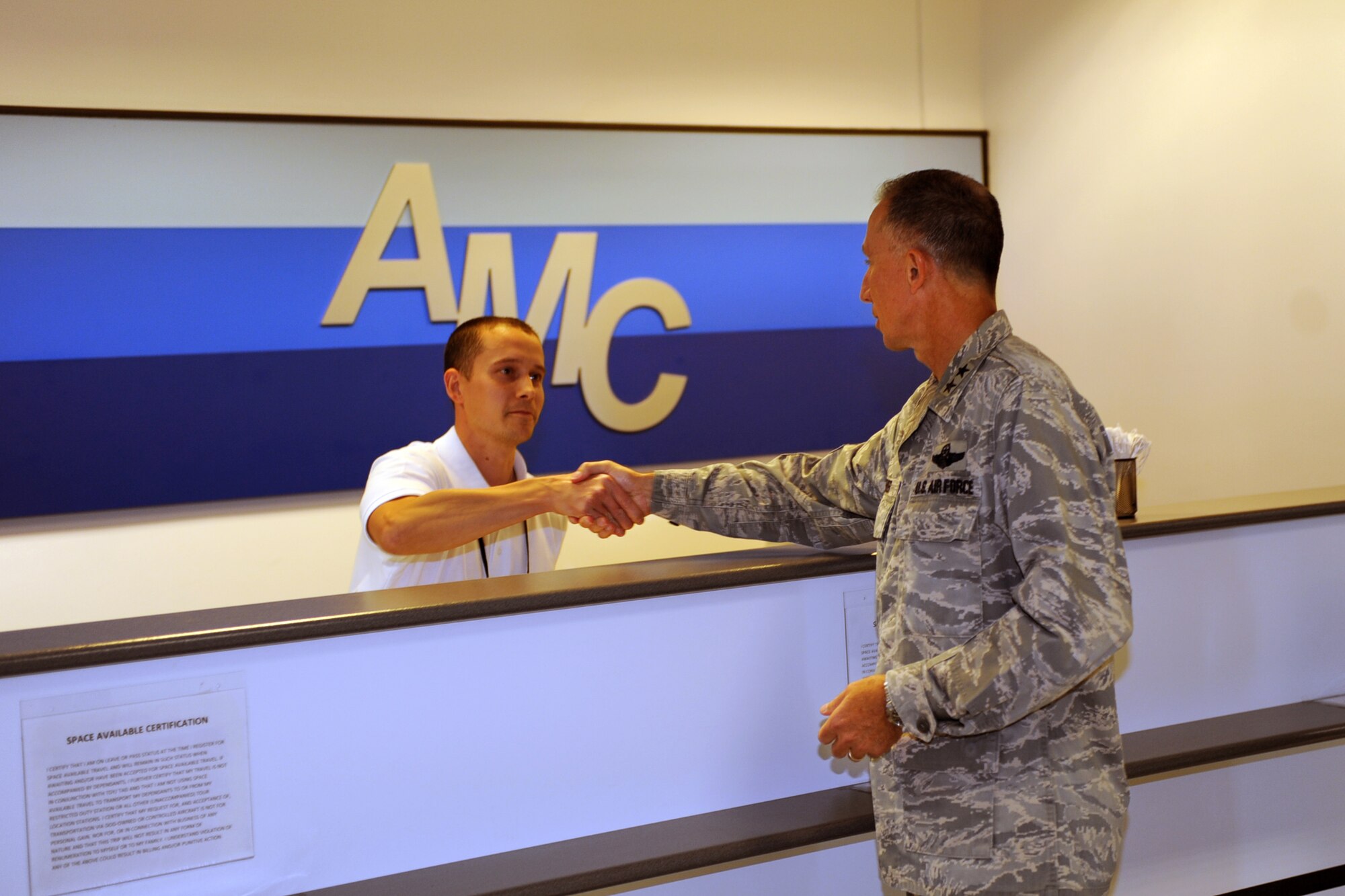 Maj. Gen. William Bender, Expeditionary Center commander talks with James Berry at the 727th Air Mobility Squadron’s passenger terminal, here, Sept. 27, 2012. The 727th AMS is a tenant unit at RAF Mildenhall and falls under the command of the Expeditionary Center. (U.S. Air Force photo/ 2nd Lt. Christopher Mesnard)