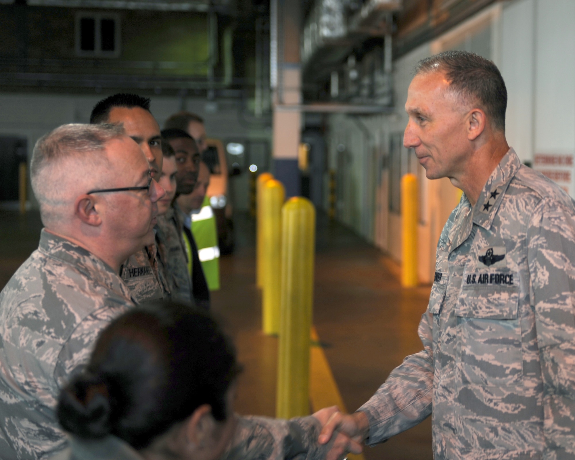 Maj. Gen. William Bender, Expeditionary Center commander talks Master Sgt. Robert Humphery, 727th Air Mobility Squadron, Superindenent Air Freight, here, Sept. 27, 2012. The general visited the 727th AMS as a part of a visit to England to more effectively utilize the assets that he commands. (U.S. Air Force photo/ 2nd Lt. Christopher Mesnard)