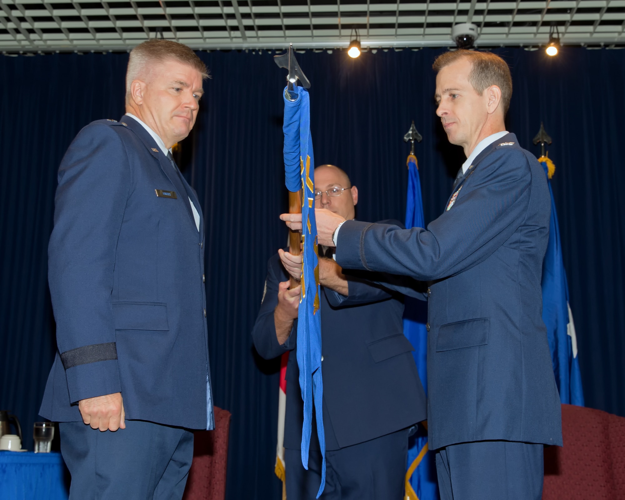YOKOTA AIR BASE, Japan -- U.S. Air Force Brig. Gen. Jerry Harris Jr. (left), 5th Air Force vice commander, and U.S. Air Force Col. Marc Reese (right), 13th Air Force Detachment 1 commander, retire the unit's guidon during its inactivation ceremony at Yokota Air Base, Japan, Sept. 26, 2012. Headquarters 13th Air Force is inactivating and merging into Headquarters Pacific Air Forces in Hawaii, and Detachment 1 has become part of Headquarters 5th Air Force as part of the Air Force’s efforts to reduce duplication, gain efficiency, and boost operational effectiveness.  (U.S. Air Force photo by Osakabe Yasuo)