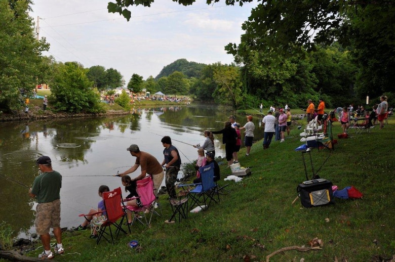 Anglers line the banks June 9, 2012 at the Cheatham Lake Fish Bustin’ Rodeo at Cheatham Lake.  A total of 168 youngsters ages 15 and below registered to fish and compete for prizes in three age groups. Parents and adult friends assisted some with casting and landing the catfish. Every child won as drawings for fishing rods, shirts and gift certificates were held throughout the event. (USACE photo by Fred Tucker)