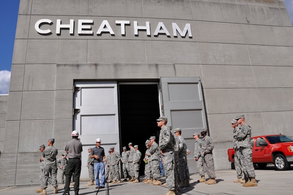 Combat engineers of Fort Campbell’s 326th Engineer Battalion, 101st Airborne Division, pause for a photo during a tour of Cheatham Lock, Dam, Power Plant and Recreational facilities May 9, 2012 to learn more about the U.S. Army Corp of Engineers “civilian missions.” Lt. Col. Pat Kinsman, commander is at left in front row. (USACE photo by Fred Tucker)