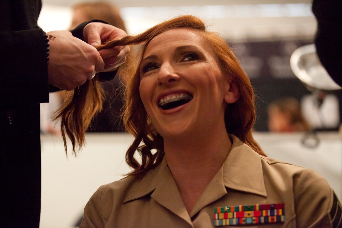 Gunnery Sgt. Stephanie Borges, a Rock Island, Ill., native, sits for a hair stylist before the "Strut: the fashionable mom" fashion show during Fashion Week NYC, Sept. 10. Borges is the aviation supply chief for Marine Aviation Logistics Squadron 49 and is the mother of four. The show featured ladies who are both business leaders and mothers.


