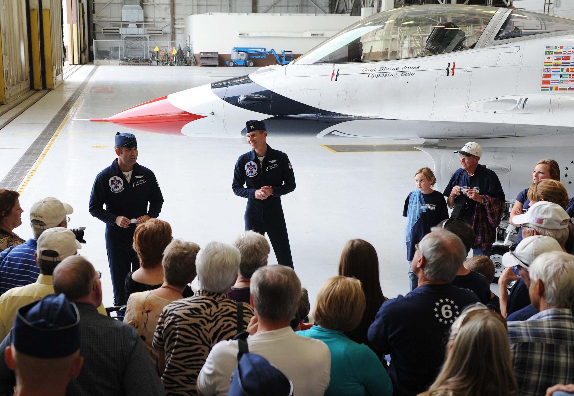 Lt. Col. Greg Moseley, U.S. Air Force Thunderbirds commander, recognizes Capt. Blaine Jones, U.S. Air Force Thunderbirds opposing solo pilot, during a FARKLE ceremony Sept. 29, 2012, McConnell Air Force Base, Kan. FARKLE ceremonies, or Family and Relatives, Kinfolk, Loved-ones, and Everyone else, are the Thunderbirds' way of showing their support for fellow team members when an air show takes place in that member's home state. (U.S Air Force photo/Airman 1st Class Katrina M. Brisbin)