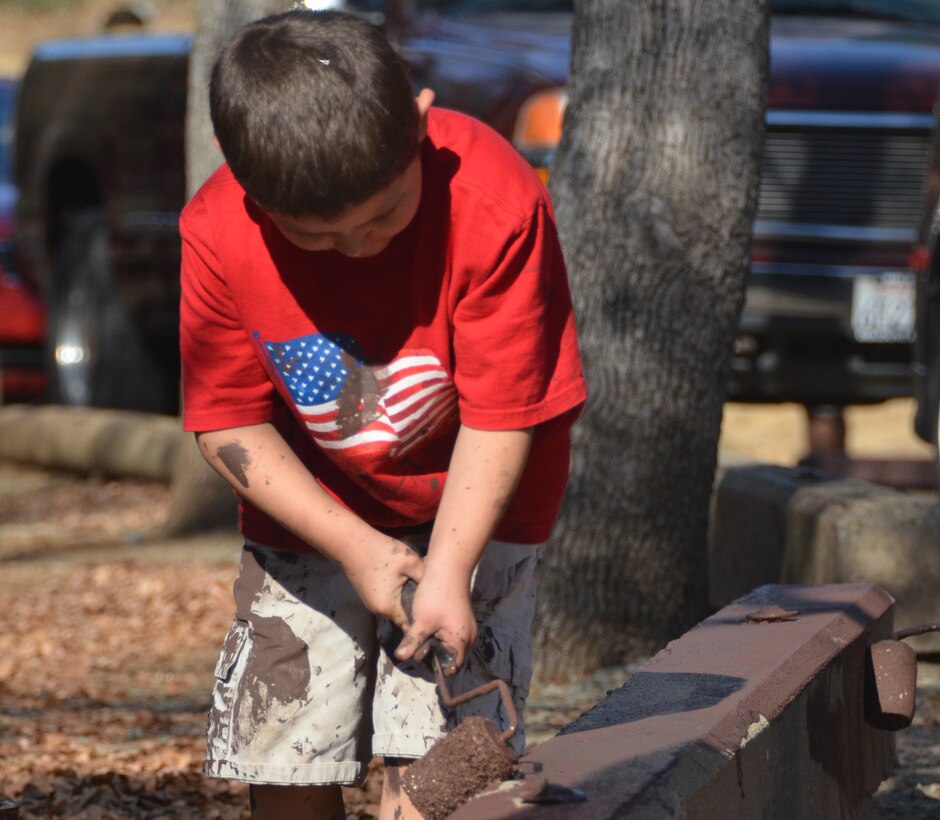 A patriotic young volunteer adds some color to New Hogan Lake park property, during National Public Lands Day, Sept. 29, 2012. Seven parks and lakes in the U.S. Army Corps of Engineers Sacramento District took part in the observation and accomplished numerous improvement projects.