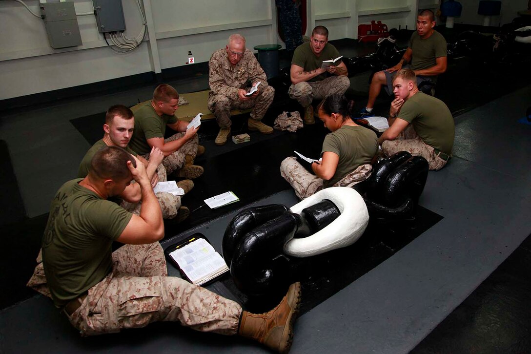Marines with the 15th Marine Expeditionary Unit conduct a bible study aboard the USS Peleliu, Sept. 27. Marines with Battalion Landing Team 3/5, 15th MEU have recently formed Darkhorse Disciples, a lay-led bible study, aboard the USS Peleliu. While infantry Marines founded the program, servicemembers of any rank or field are welcome to attend.