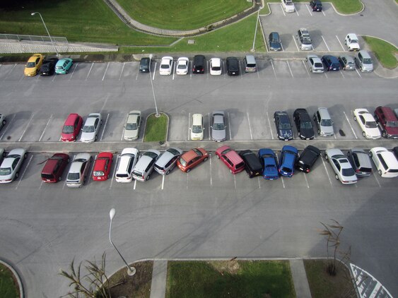 Bad parking job? No, this parking nightmare is the result of Typhoon Jelawat, which brought with it destructive winds of up to 137 mph. Jelawat was the sixth and most destructive typhoon to affect Okinawa this year. (Photo by Staff Sgt. Kenneth Lewis)