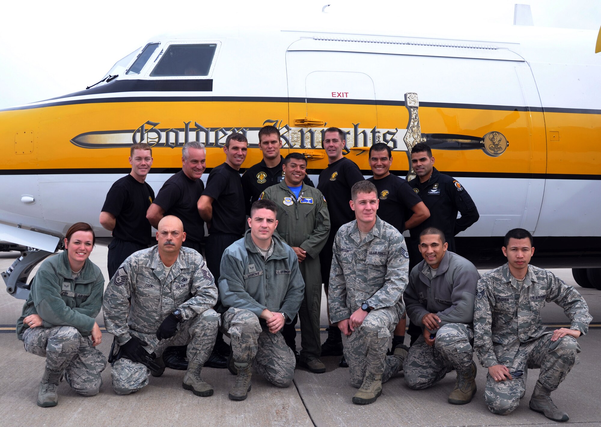 Seven members of Team McConnell had the opportunity to ride along with the U.S. Army Golden Knights Parachute Demonstration Team during their performance at the Wings Over McConnell air show at McConnell Air Force Base, Kan., Sept. 30, 2012.  Team McConnell members are, left to right, Senior Airman Ellie Fry, 931 CES, Master Sgt. Frank Cook, 184 SFS, Senior Airman Andrew Shirling, 931 MXS, Major Eliud Torres, 22 ARW/ADO, Staff Sgt. Cameron Carlson, 284 ASOS, Senior Airman Michael Davis, 22 OSS/OSO, and Senior Airman Jacinto Flores, 22 MDG.  (U.S. Air Force photo by 1st Lt. Zach Anderson)