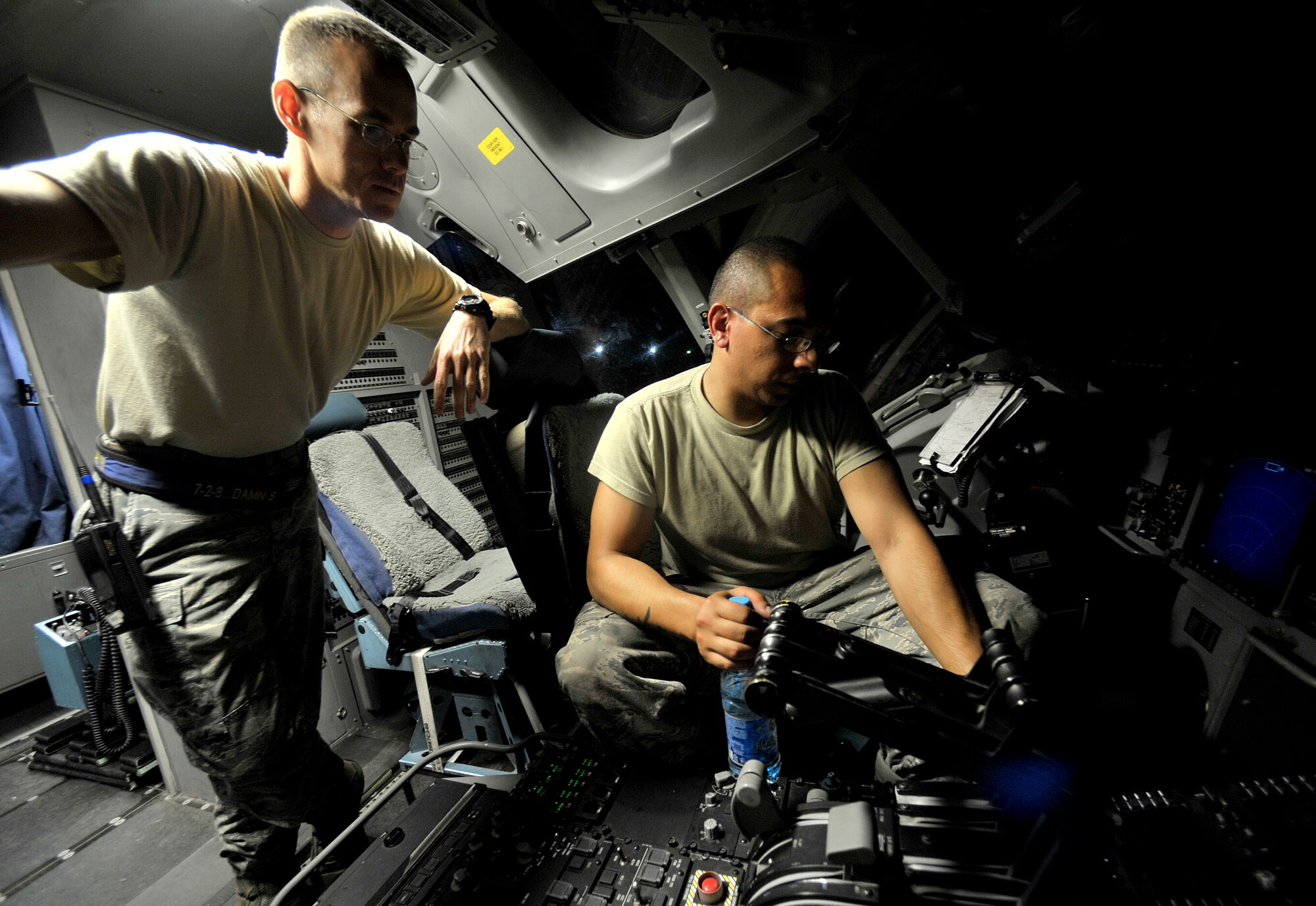 U.S. Air Force Tech. Sgt. Dallas Powers, 728th Air Mobility Squadron, Operation Location-Alpha expediter, conducts a post-flight inspection of a C-17 Globemaster III with Senior Airman Matthew Calvo at Transit Center at Manas, Kyrgyzstan, Sept. 15, 2012. TSgt Powers and his crew of maintainers are an important piece of keeping the C-17, with its expansive airlift and transport capabilities, operational in the area of responsibility. Redeployment is the result of the success of the transition process and the return of control of territory to the Afghan people. Redeployment is the natural outcome of successful transition to an Afghan lead for security.
(U.S. Air Force photo/Staff Sgt. Clay Lancaster)