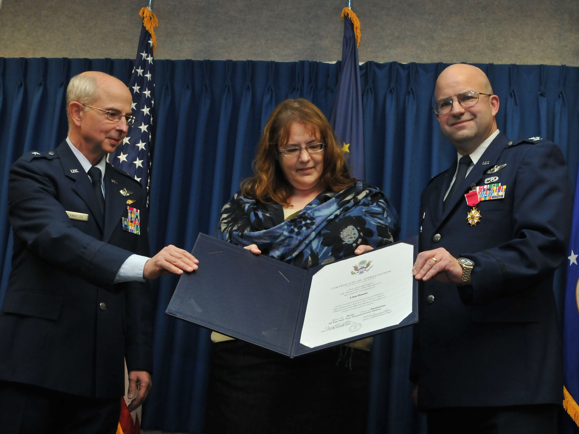 JOINT BASE ELMENDORF-RICHARDSON, Alaska - Col. Robert A. K. Doehl, the 176 Wing vice commander, celebrates his retirement here Sep. 23. Lisa Doehl, his wife, received an appreciation award. Alaska Air National Guard photo by Staff Sgt. N. Alicia Goldberger