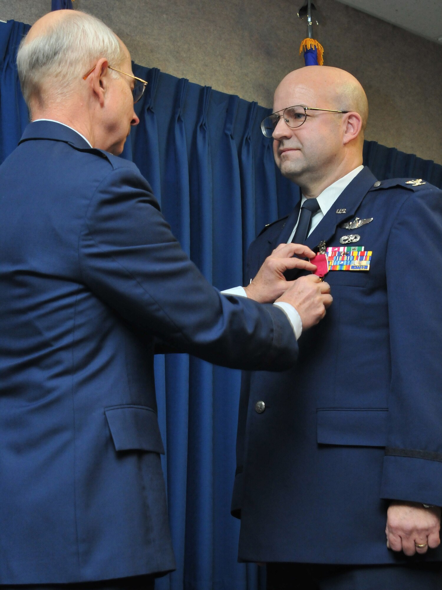 JOINT BASE ELMENDORF-RICHARDSON, Alaska - Col. Robert A. K. Doehl, the 176 Wing vice commander, celebrates his retirement here Sep. 23. Doehl received a retirement ribbon. Alaska Air National Guard photo by Staff Sgt. N. Alicia Goldberger