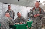 Army National Guard Director Lt. Gen. Clyde A. Vaughn speaks to deployed Guardsmen at the Kandahar Airfield main dining facility Mar. 4.