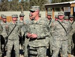 Capt. Scott J. Rohweder, commander of Echo Company, 2nd Combined Arms Battalion, 136th Infantry Regiment addresses his Soldiers during a formation in November 2006. Rohweder was recently named as one of 28 company-grade officers who will receive the General Douglas MacArthur Leadership Award during a ceremony May 16 in Washington, D.C.