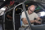 Staff Sgt. Dennis Tillery refits an Army National Guard OH-58 Kiowa helicopter for Operation Jump Start (OJS) duty at the Mississippi Army National Guard's 1108th Aviation Classification and Repair Depot (AVCRAD) in Gulfport, Miss., on March 23, 2007. Thirty-six Kiowas are being upgraded and overhauled at the National Guard's four AVCRADs for OJS, the National Guard's mission to assist the Border Patrol in securing the U.S. border with Mexico. (U.S. Army photo by Sgt. Jim Greenhill) (Released)