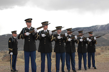 Sgt. Charles Rice commands the Oregon honor guard's firing detail during the National Guard Bureau's first National Honor Guard Competition held in Reno, Nev., from March 20-22. The team won the competition. Team members are, from left, Sgt. Robert "Luke" Summers, Sgt. Kenneth Kaiser, Spc. Scott Mahe, Sgt. Thomas Barella, Sgt. Timothy Tompkins, and Staff Sgt Jeromy Turner, the team's noncommissioned officer in charge.