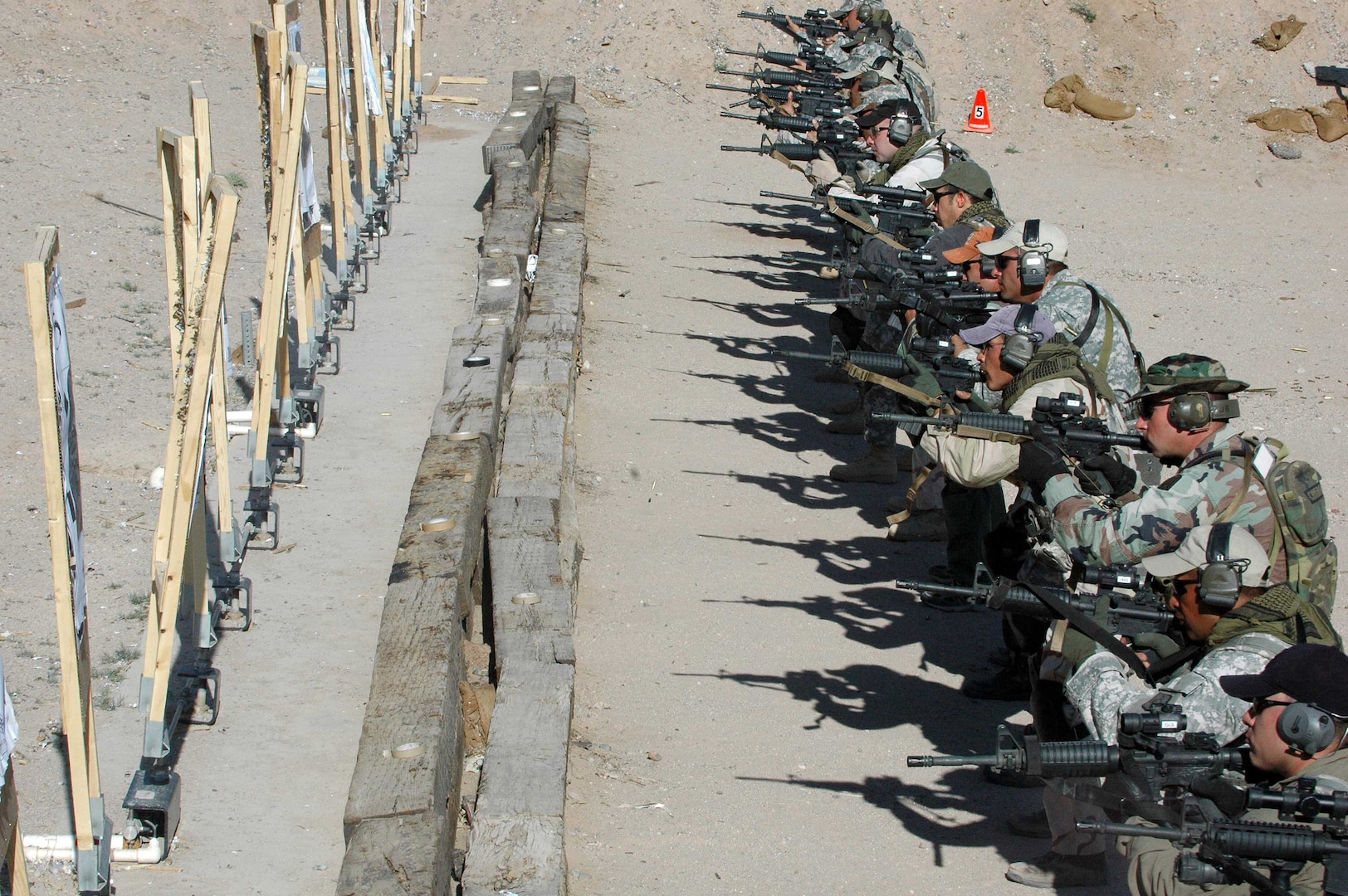 National Guard members and representatives of other federal, state and local agencies with homeland security missions conduct a close-range firing drill during the Gunfighter Course near Albuquerque, N.M., on May 31, 2007.