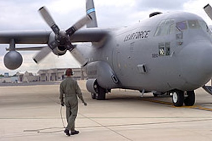 A Delaware Air National Guard C-130 Hercules prepares to taxi at the New Castle County Airport, Del., June 14 for a training flight commemorating the 166th Airlift Wing's 160,000th accident-free flight hour.