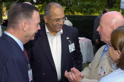 Paul McHale, assistant secretary of defense for homeland defense; retired Lt. Gen. Tariq Waseem Ghazi, Pakistan's former defense secretary; LTG H Steven Blum, the chief of the National Guard Bureau, and Marine Lt. Gen. Frances Wilson, president, National Defense University, talk about a possible National Guard State Partnership Program with Pakistan at a dinner at Blum's official residence at Fort McNair, Washington, D.C., on July 25, 2007.