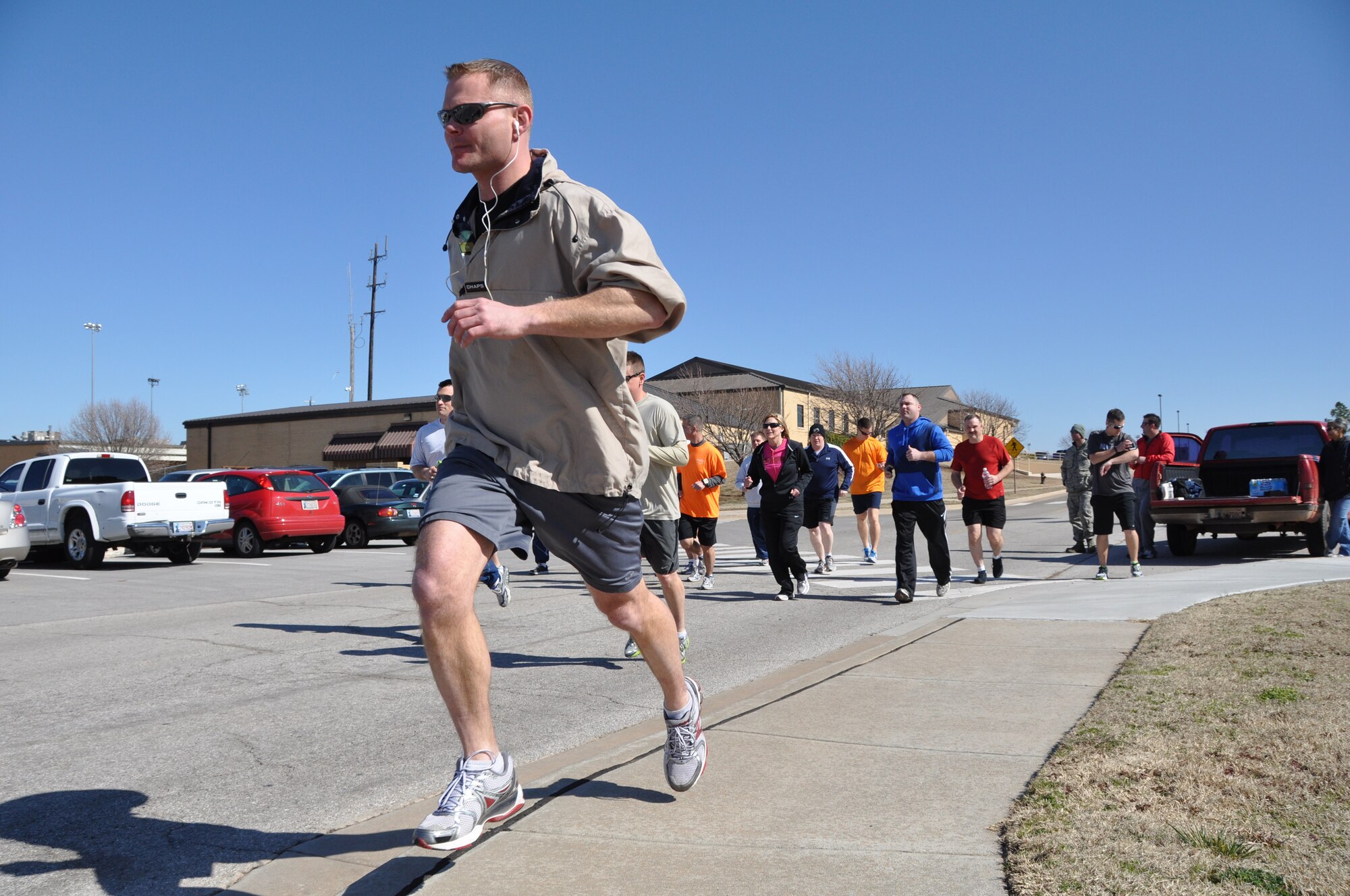 TINKER AIR FORCE BASE, Okla -- Capt. Patrick Mitchell and members of the 507th Air Refueling Wing run the 5k “fun run” during the March unit training assembly.  The Tinker Reserve Enlisted Advisory Council sponsored the run to raise money for enlisted members to run in the upcoming Oklahoma City Memorial Day Marathon in April.   (U.S. Air Force photo by Tech. Sgt. Grady Epperly)