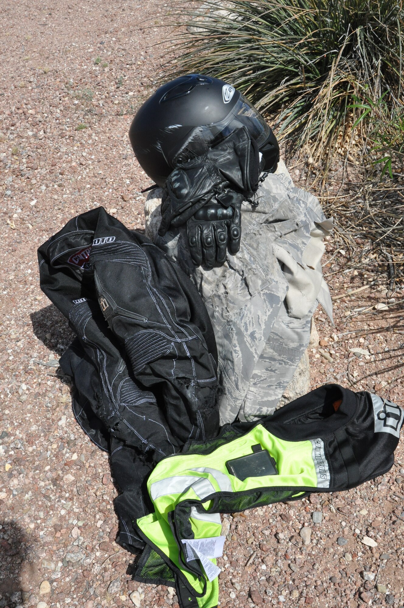 Master Sgt. David Alderton , 12th Air Force (Air Forces Southern) Force Protection,  shows off the motorcycle personal protective equipment saved his life during a near fatal motorcycle accident on interstate 19 in Tucson, Ariz., March 27. (USAF photo by Master Sgt. Kelly Ogden/Released). 