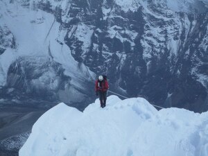 U.S. Air Force Capt. Kyle "Husky" Martin gains the ridge of Ama Dablam during a trip to eastern Nepal in 2012. The main peak, which stands at 22,349 feet, is one of the most popular Himalayan Mountain climbs permitted to the public. Martin is an Air Force Academy graduate and now serves as the T-38 division chief for the 1st Operations Group at Langley Air Force Base, Va. (Courtesy photo) 