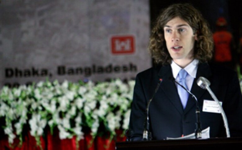 Justin Pummell welcomes participants and introduces speakers during the third annual Pacific Resilience Disaster Response Exercise and Exchange 2012 in Dhaka, Bangladesh.