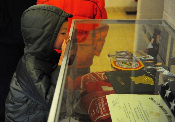 Ryan, 5, takes a closer look at an awards case during a family visit to The Basic School on March 28, 2013. Medal of Honor recipient 1st Lt. Baldomero Lopez, Ryan’s great uncle, will to have a building dedicated to him later this year.