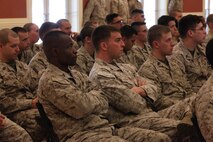 Servicemembers with 2nd Medical Battalion, Combat Logistics Regiment 25, 2nd Marine Logistics Group attend a presentation about military women held by the unit aboard Camp Lejeune, N.C., March 27, 2013. Marines and sailors with the battalion honored female servicemembers and discussed the contributions of several notable women within the naval services. 