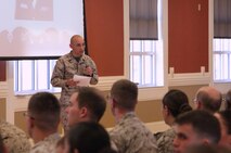 Petty Officer 3rd Class Zacharia D. Raymaker, a corpsman with 2nd Medical Battalion, Combat Logistics Regiment 25, 2nd Marine Logistics Group, speaks about Rear Adm. Grace Hopper during an event held aboard Camp Lejeune, N.C., March 27, 2013. The battalion hosted the meeting to focus on distinguished female servicemembers and their legacies.
