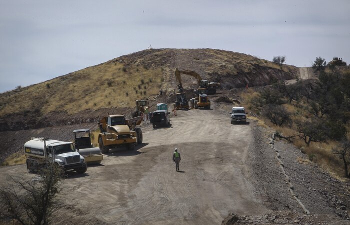 U.S. Marine Corps Staff Sgt. William T. Rueppel, safety staff noncommissioned officer-in-charge assigned to Engineer Company, Marine Wing Support Squadron 272, Marine Corps Air Station New River, N.C., monitors his Marines who are constructing a border security road near Nogales, Ariz., Mar. 19.